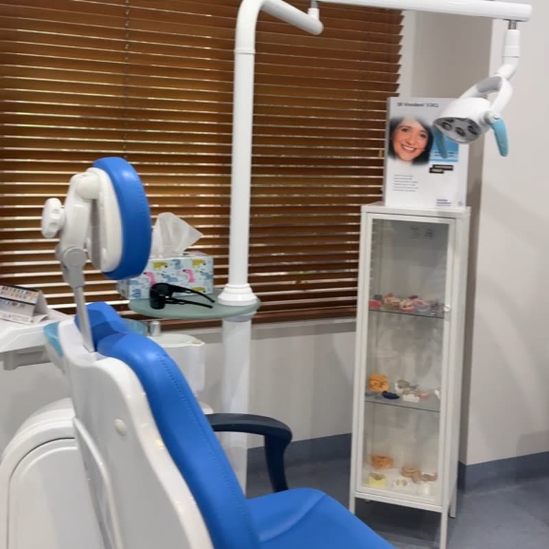 The treatment room, with the chair, light and instrument cabinet